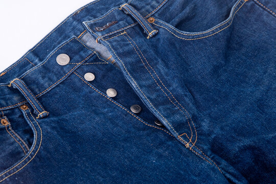 Button width close up. Levi Strauss blue denim jeans. Ukraine, Kyiv - October 2, 2025