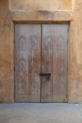 Architectural elements of buildings, ancient arches, windows, and doors. On the streets of the Emirates, in public spaces.