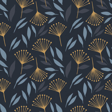 Floral seamless pattern with mustard dandelion flowers and blue leaves on dark navy background modern botanical design for fabric textile wallpaper wrapping paper and decorative surface.