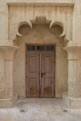 Architectural elements of buildings, ancient arches, windows, and doors. On the streets of the Emirates, in public spaces.