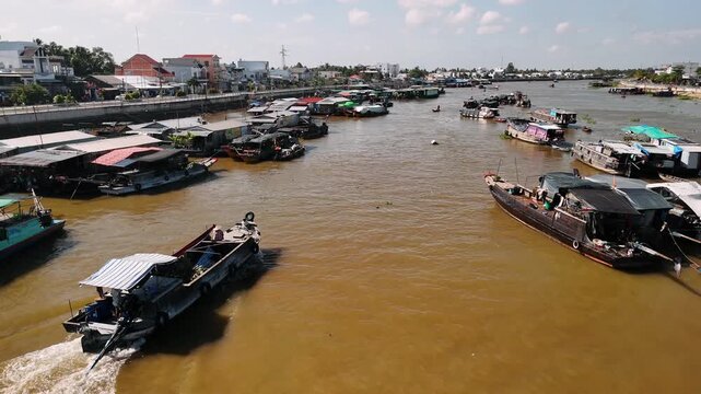 Aerial view of cai rang floating market. Traditional asian sampans and longboats trading on the mekong river, can tho, vietnam