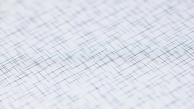 Soft, angled close-up of a grid pattern with subtle, blue-gray lines on white