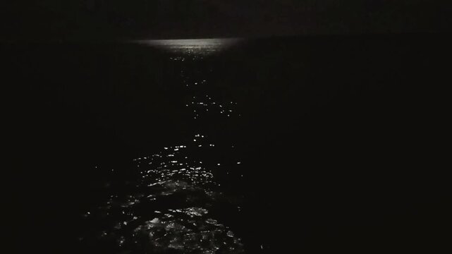 water drops and waves on dark night black background