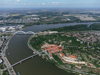 Obraz premium Drone areal shot of Petrovaradin fortress located on the Danube River bank across from Novi Sad. Serbia.