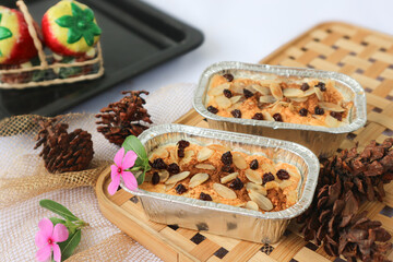 Fototapeta premium Klappertaart, a Dutch-influenced Indonesian coconut tart originating from Manado, North Sulawesi. This sweet dessert is made from egg yolks, flour, sugar, milk, butter, and coconut flesh.