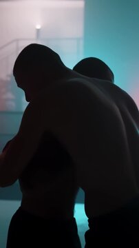 Intense Boxing Training and Fight: Professional Boxers Sparring in Ring, Close-up Portraits, Jumping Rope, Push-ups, and Cinematic Gym Workout Sessions with Athletic Men.