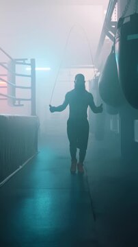 Intense Boxing Training and Fight: Professional Boxers Sparring in Ring, Close-up Portraits, Jumping Rope, Push-ups, and Cinematic Gym Workout Sessions with Athletic Men.