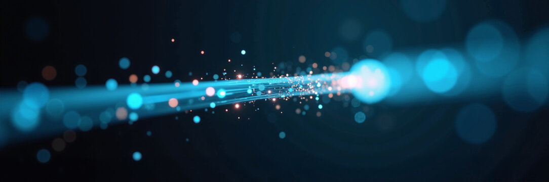 Light rays and sparkling particles creating an abstract visual of glowing energy. Bright light beams extend with colorful bokeh against a dark backdrop, showcasing a dynamic and vibrant atmosphere.
