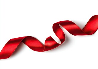 A vibrant, curly red satin ribbon on a clean white background, creating a decorative design