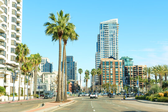San Diego, California - December 30, 2025: Modern Skyscrapers And Palm Trees On A San Diego Street Way