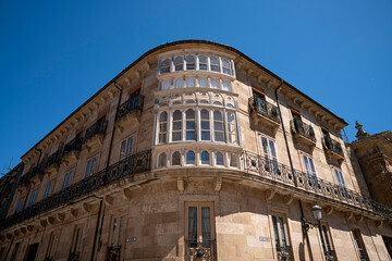Fototapeta premium Architectural building with ornate balconies and windows.
