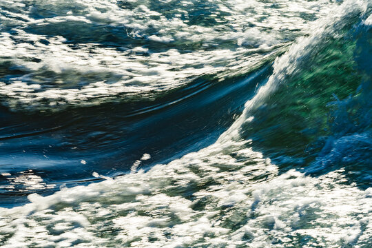 closeup shot of a standing wave in whitewater