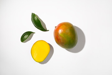 Flat lay with mango on color background, top view