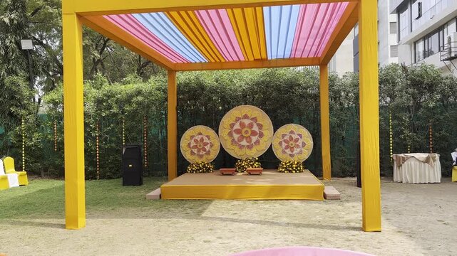 Haldi ceremony stage decoration at wedding hall