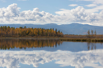 Autumn landscape with mountains and a lake. Russia. Buryatia. Siberia