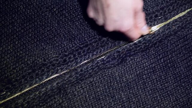 Zipping and Unzipping Metal Jacket Zipper with Fast Metallic Rustling and Friction Sound
