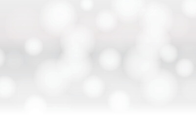 白い光の玉ボケが広がる抽象的な背景