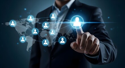 Fototapeta premium Businessman connecting global network of people and data on a world map interface, technology concept.