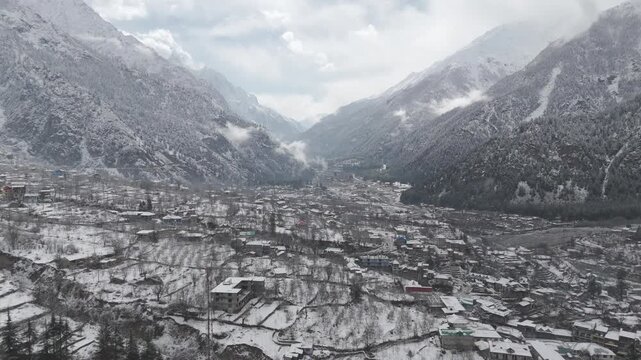 Sangla Winter Drone Shot | Sangla in winters (October-February) is a serene, snow-covered wonderland in Himachal Pradesh's Kinnaur district, featuring temperatures often falling below 
 at night.