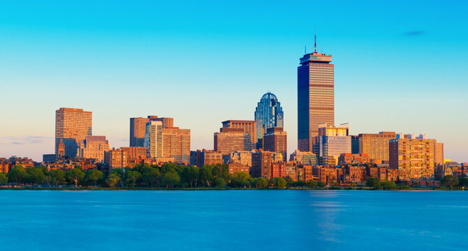 Evening panorama of Boston, cityscape viewed from Cambridge across the Charles River, Massachusetts, USA