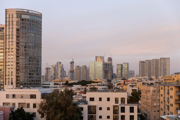 Fototapeta premium Tel Aviv, Israel, 15 February 2026, Wide shot of a metropolitan area with tall office towers and residential blocks.