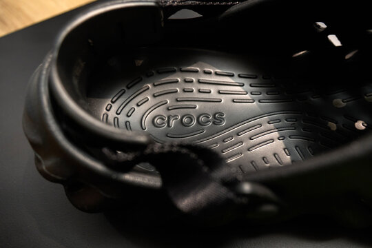 Tyumen, Russia-February 15, 2026: black Crocs Echo Clog shoes are shown up close. The shoes have a logo and holes for airflow