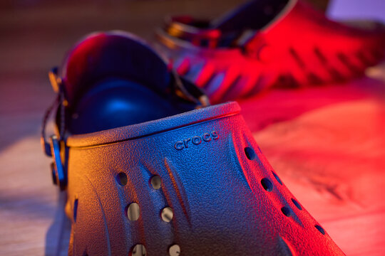 Tyumen, Russia-February 15, 2026: crocs shoes focused on Echo Clog style in unique lighting setup at a local store display