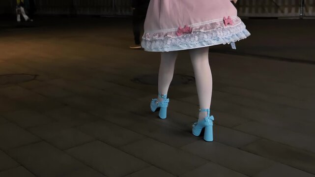 Lolita fashion legs walking, pastel dress, blue high heels, Harajuku street style