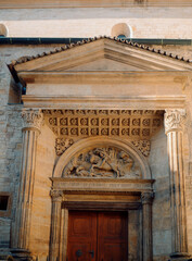 Obraz premium Prague Baroque Portal, Detailed View Of Baroque Architecture With Golden Tones And Shadows