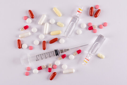 Assorted medication with syringe and ampoules