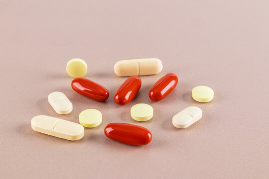 Assorted medicine pills and capsules on a table