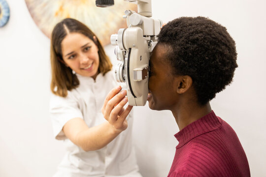 Eye examination with an optician in a modern clinic