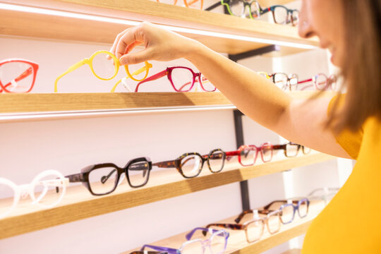 Variety of glasses in modern optical store
