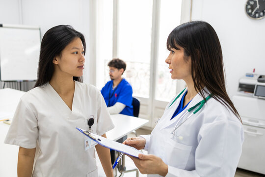 Medical team discussion in hospital setting