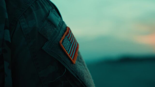 American Flag Memorial Day on a Soldiers Arm on the Beach After Sunset