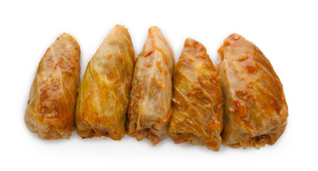 Delicious stuffed cabbage rolls isolated on white, top view