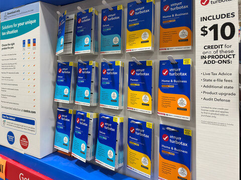 Northville, Michigan, USA - Jan 31, 2026 : Costco shelf display featuring multiple Intuit TurboTax editions, including Deluxe, Premier, and Business for federal and state income tax filing options.