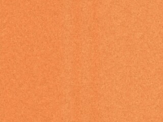 Fototapeta premium Vibrant solid orange paper texture background for creative design projects