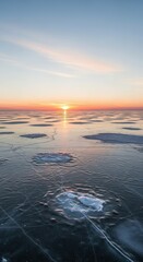 Obraz premium Brilliant low sunlight illuminates textured frozen surface extending to the horizon