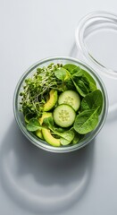 Obraz premium Crystal clear container holding a carefully curated, single serving of ultra-fresh, bright green produce ready for consumption, convenient, plastic, catering