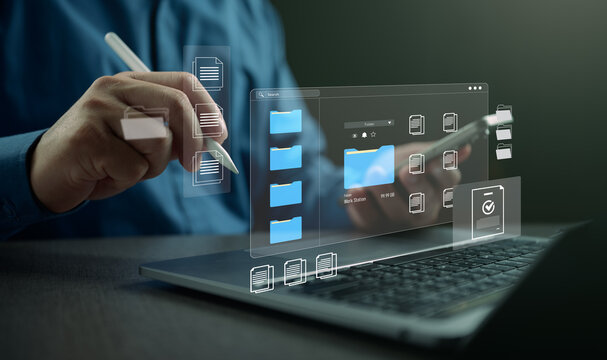 Digital file management and cloud document storage concept with virtual folders and data organization interface on laptop. Online backup, secure document management and business workflow system. DMS
