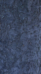 Naklejka premium Dark tree bark texture with moss natural background closeup