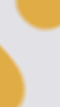 Blurred circular shapes float on a light gray field