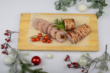 Festive Bacon-Wrapped Meat Roulade with Christmas Decorations