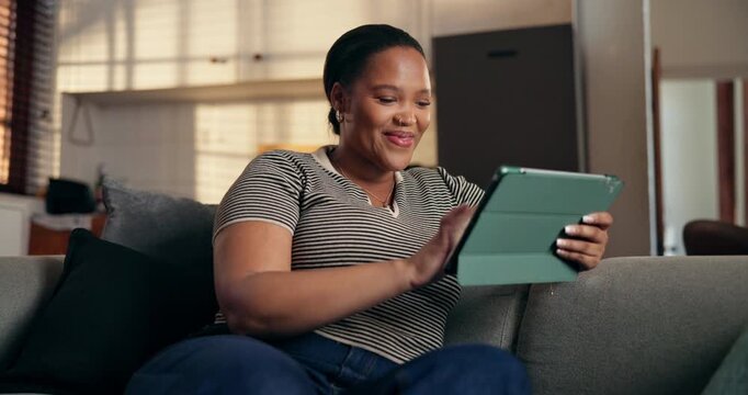 Smile, woman and relax with tablet at house for social media, browsing website and calm morning. Happy, female person and scroll with digital, streaming movies and download ebook for weekend break