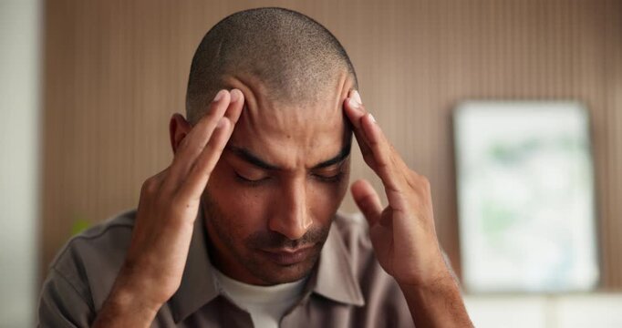 Business, man and discomfort of headache in office from stress, employee fatigue and burnout. Frustrated, male person and migraine ache for workload pressure, brain fog or vertigo or deadline tension