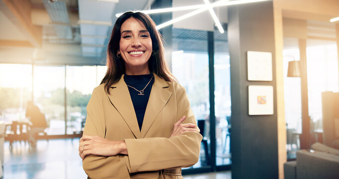Portrait, smile and business woman with arms crossed or career experience, about us or investor. Confidence, mature executive and happy person in corporate company as finance manager with flare