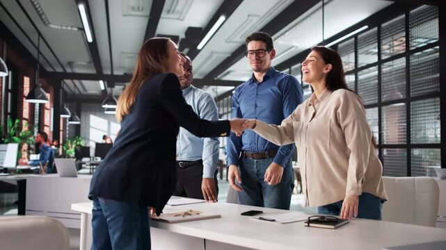 Woman Shaking Hands With Interviewers After Finishing The Interview