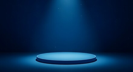 A blue circular platform illuminated by a spotlight in a dark room