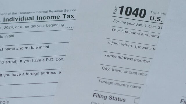 Close-up Unfilled 1040 Tax Form Blanks, Concept of Tax Payment and Declaration Filing for US Individuals